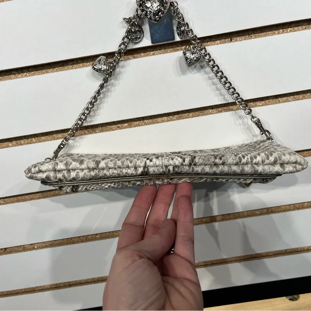 Kathy Van Zeeland faux leather clutch